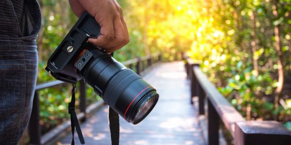 a man with a camera in his hand.